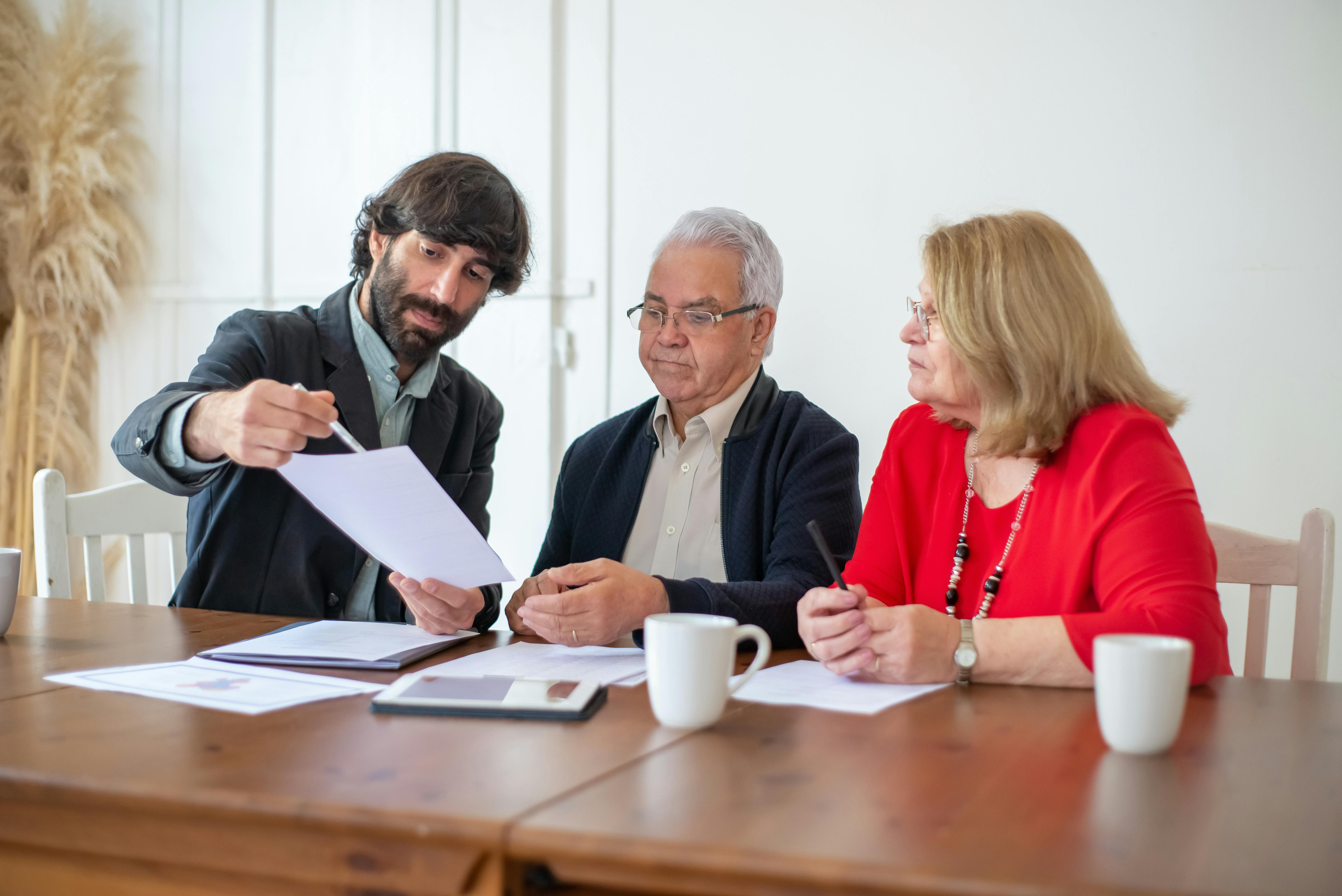 Two people in a consultation setting, illustrating TPD Claim Support's guiding principle of clear guidance and confident claims